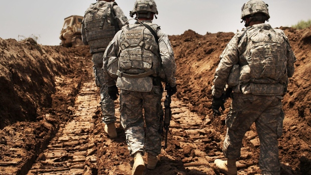U.S. soldiers in Iskandariya, Babil Province Iraq. Photographer: Spencer Platt/Getty Images