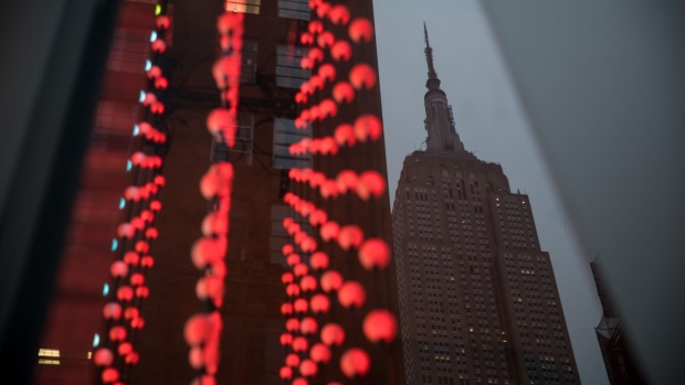 The Empire State Building is reflected in a building. Photographer: Michael Nagle/Bloomberg