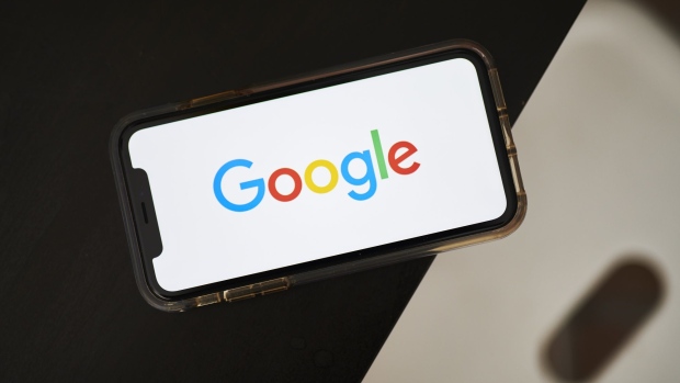 The Google logo is displayed on an iPhone. Photographer: Gabby Jones/Bloomberg