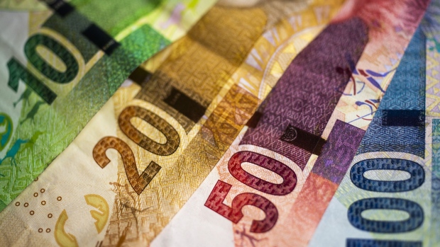 South African rand banknotes sit in this arranged photograph in Pretoria, South Africa, on Wednesday, Aug. 14, 2019. The rand ended a tumultuous week on a positive note, gaining against the dollar for a second day and heading for its first weekly advance in four as technical indicators suggested recent declines are overdone. Photographer: Waldo Swiegers/Bloomberg