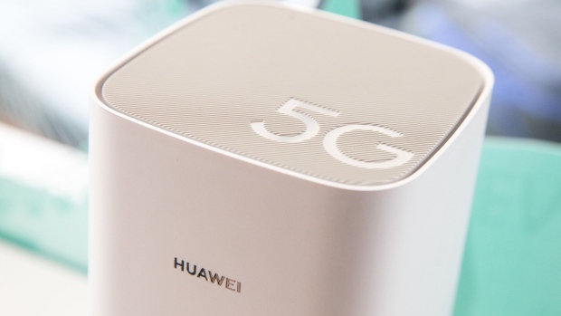 A 5G CPE (customer-premises equipment) Pro router, manufactured by Huawei Technologies Co., sits on a display following a news conference announcing the rollout of BT Group Plc's EE 5G network in London, U.K., on Wednesday, May 22, 2019. BT won't offer phones from Huawei when it starts Britain's first 5G mobile network next week in the face of a U.S. crackdown on the Chinese firm. Photographer: Bloomberg/Bloomberg