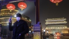 GETTY IMAGES - A Chinese man wears a protective mask in Beijing