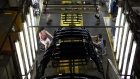 Employees work on the floor at the Magna International Inc. Polycon Industries auto parts manufacturing facility in Guelph, Ontario, Canada, on Thursday, Aug. 30, 2018. Canadian stocks and the dollar extended gains Monday on news of a U.S.-Mexican trade agreement, shrugging off U.S. President Donald Trump's threats that Canada might be frozen out and instead face auto tariffs. 