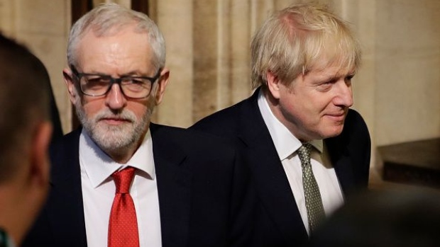LONDON, ENGLAND - DECEMBER 19: Prime Minister, Boris Johnson and Leader of the Labour Party, Jeremy Corbyn leave after the state opening of parliament at the Houses of Parliament on December 19, 2019 in London, England. In the second Queen's speech in two months, Queen Elizabeth II will unveil the majority Conservative government's legislative programme to Members of Parliament and Peers in The House of Lords. (Photo by Kirsty Wigglesworth - WPA Pool/Getty Images)