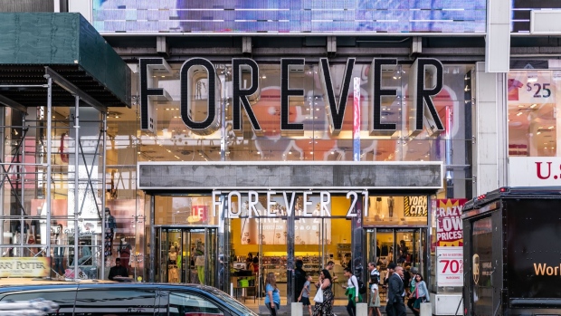 A Forever 21 Inc. store stands in the Times Square neighborhood of New York, U.S., on Thursday, Aug. 29, 2019. Forever 21 Inc. is preparing for a potential bankruptcy filing as the fashion retailer’s cash dwindles and turnaround options fade, according to people with knowledge of the plans. Photographer: Jeenah Moon/Bloomberg