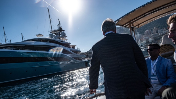 A tender boat passes luxury superyacht Go, manufactured by Turquoise Yachts, during the Monaco Yacht Show (MYS) in Port Hercules, Monaco, on Wednesday, Sept. 26, 2018. Over 125 of the world's most luxurious yachts will be displayed during the 28th MYS, which runs Sept. 26 - 29. Photographer: Balint Porneczi/Bloomberg