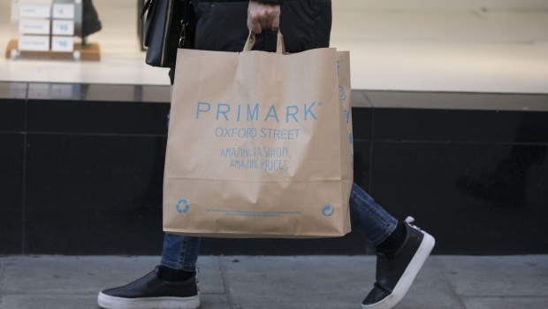 A pedestrian carries a shopping bag from a Primark clothing store, operated by Associated British Foods Plc, in London, U.K., on Monday, Feb. 10, 2020. European retailers are likely to see coronavirus fallout spread from Chinese retail sales to supply chains, causing disruptions globally and affecting profit, according to Bloomberg Intelligence. Photographer: Jason Alden/Bloomberg