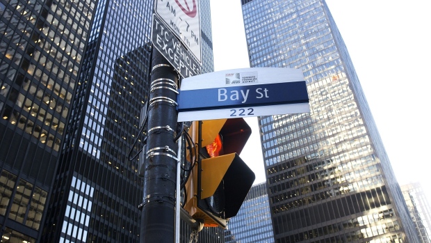 A "Bay Street" sign is displayed in the financial district of Toronto, Ontario, Canada, on Friday, Feb. 21, 2020.