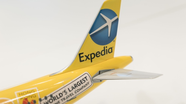 The Expedia Inc. logo is displayed on a model of an aircraft at the company's offices in Hong Kong, China, on Friday, Oct. 13, 2017. Southeast Asia is Expedia's fastest-growing region in Asia and "extremely exciting" for the company, said Jonty Neal, chief executive officer of Expedia Asia during an interview. Photographer: Anthony Kwan/Bloomberg