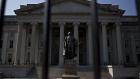 A statue of Albert Gallatin, former U.S. Treasury secretary, stands outside the U.S. Treasury building in Washington, D.C., U.S., on Monday, July 16, 2018. The House this week plans to consider a minibus spending bill that combines legislation funding the Treasury, Internal Revenue Service (IRS), and the Securities and Exchange Commission (SEC) with another bill keeping the Interior Department and Environmental Protection Agency (EPA) running. Photographer: Andrew Harrer/Bloomberg