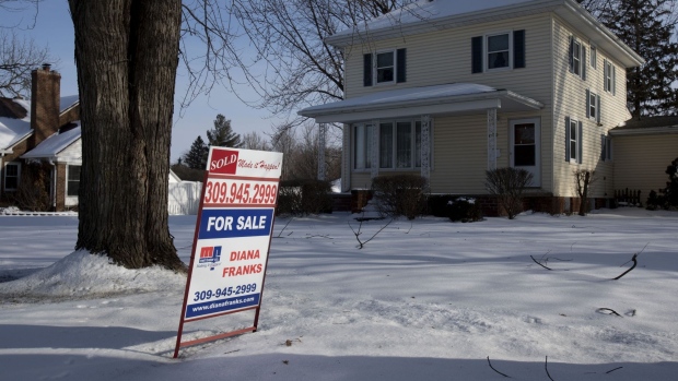 A "Sold" sign stands outside a home following a snow fall in Geneseo, Illinois, U.S., on Monday, Jan. 20, 2020. Photographer: Daniel Acker/Bloomberg