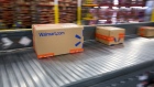 Packages move along a conveyor belt inside a Wal-Mart Stores Inc. fulfillment center in Bethlehem, Pennsylvania. Photographer: Michael Nagle/Bloomberg