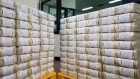 Bundles of South Korean 50,000 won banknotes sit stacked at the Bank of Korea (BOK) Gangnam office building in Seoul, South Korea, on Tuesday, Sept. 10, 2019. The limits of interest rate policy are coming into focus worldwide as the global economy slows, given that many benchmark rates remain well below long-term norms. BOK's rate is already sitting at 1.5%, only a quarter percentage point above a record low. Photographer: SeongJoon Cho/Bloomberg
