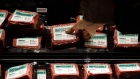 A customer picks up a package of Impossible Burger plant based meat during the Impossible Foods Inc. grocery store product launch at Gelson's Markets in Los Angeles, California, U.S., on Friday, Sept. 20, 2019. The Impossible Burger made its retail debut at 27 Gelson's Markets locations in Southern California before expanding its retail presence in the fourth quarter and in early 2020, the company said in a statement. Photographer: Patrick T. Fallon/Bloomberg
