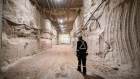 A miner walks towards an airlock at the entrance to the Nutrien Ltd. Cory potash mine in Saskatoon, Saskatchewan, Canada, on Monday, Aug. 12, 2019. Nutrien sees potash consumption though 2023 rising faster than demand for the two other main types of fertilizer and said that demand may reach 75.5 million tons a year. Photographer: James MacDonald/Bloomberg