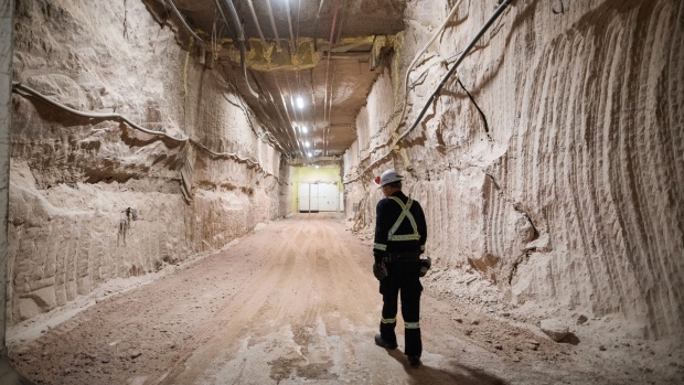 A miner walks towards an airlock at the entrance to the Nutrien Ltd. Cory potash mine in Saskatoon, Saskatchewan, Canada, on Monday, Aug. 12, 2019. Nutrien sees potash consumption though 2023 rising faster than demand for the two other main types of fertilizer and said that demand may reach 75.5 million tons a year. Photographer: James MacDonald/Bloomberg