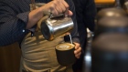 A barista poor milk in a coffee order at the Starbucks Reserve Roastery and Tasting Room in Seattle, Washington, U.S., on Monday, Oct. 9, 2017. China is Starbucks Corp.'s biggest growth opportunity, and its expansion there could last decades without letting up. Though the U.S. will remain a key market, the company's crusade to spread lattes and macchiatos across the Asian nation is key to its future Photographer: Mike Kane/Bloomberg