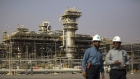 Employees visit the Natural Gas Liquids facility in Saudi Aramco's Shaybah oilfield in the Rub' Al-Khali (Empty Quarter) desert in Shaybah, Saudi Arabia. 