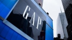 Gap Inc. signage is displayed outside a store in the Times Square area of New York. Photographer: Mark Kauzlarich/Bloomberg
