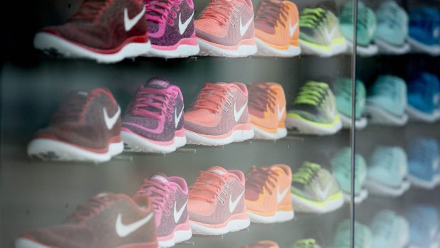 Nike Inc. 'Free' model sneakers sit on display in the window of the Nike Store inside the Westfield London shopping mall, operated by Westfield Corp. in London, U.K.