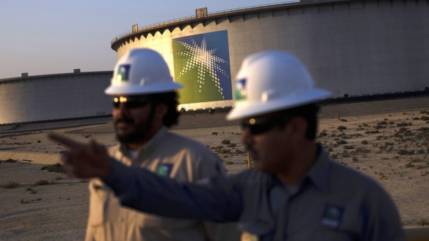 Crude oil storage tanks stand in the Juaymah tank farm at Saudi Aramco's Ras Tanura oil refinery and terminal at Ras Tanura, Saudi Arabia, on Monday, Oct. 1, 2018. Speculation is rising over whether Saudi Arabia will break with decades-old policy by using oil as a political weapon, as it vowed tohit backagainst any punitive measures after the disappearance of government criticJamal Khashoggi. Photographer: Simon Dawson/Bloomberg