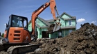 A worker operates a Hitachi Construction Machinery Co. excavator to dig a trench outside a new home under construction at a Lennar Corp. development in Montgomery, Illinois, U.S., on Wednesday, May 15, 2019. A stronger-than-expected increase in housing starts at the beginning of the second quarter bodes well for residential investment to make a contribution to GDP growth after five quarters of declines. Photographer: Daniel Acker/Bloomberg