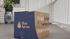 A Blue Apron meal-kit delivery package sits outside a home. Photographer: Daniel Acker/Bloomberg
