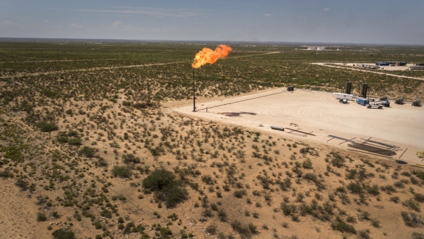 A gas flare is seen in this aerial photograph taken above a field near Mentone, Texas, U.S., on Saturday, Aug. 31, 2019. Natural gas futures headed for the longest streak of declines in more than seven years as U.S. shale production outruns demand and inflates stockpiles. Photographer: Bronte Wittpenn/Bloomberg