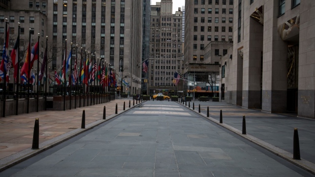 An empty Rockefeller Center is seen in New York, U.S., on Thursday, March 19, 2020. New York state Governor Andrew Cuomo on Thursday ordered businesses to keep 75% of their workforce home as the number of coronavirus cases rises rapidly. Photographer: Michael Nagle/Bloomberg