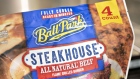 A package of Tyson Foods Inc. Ball Park brand steakhouse pre-cooked beef patties is arranged for a photograph in Tiskilwa, Illinois, U.S., on Monday, Aug. 6, 2018. The largest U.S. meat company posted better-than-expected fiscal third-quarter earnings as beef demand rose and cattle costs fell, Tyson said Monday in a statement. Photographer: Daniel Acker/Bloomberg