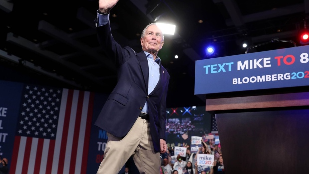 WEST PALM BEACH, FLORIDA - MARCH 03: Democratic presidential candidate former New York City mayor Mike Bloomberg waves to his supporters at his Super Tuesday night event on March 03, 2020 in West Palm Beach, Florida. 1,357 Democratic delegates are at stake as voters cast their ballots in 14 states and American Samoa on what is known as Super Tuesday. (Photo by Joe Raedle/Getty Images)