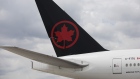 An Air Canada plane sits parked at Toronto Pearson International Airport (YYZ) in Toronto, Ontario, Canada, on Monday, July 22, 2019. Air Canada is scheduled to release earnings figures on July 30. Photographer: Brent Lewin/Bloomberg
