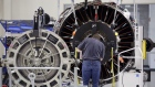 An employee assembles a LEAP jet engine at the General Electric Co. (GE) Aviation assembly plant in Lafayette, Indiana, U.S., on Friday, July 19, 2019. General Electric is scheduled to release earnings figures on July 31. Photographer: Luke Sharrett/Bloomberg