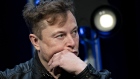 Elon Musk, founder of SpaceX and chief executive officer of Tesla Inc., listens during a discussion at the Satellite 2020 Conference in Washington, D.C., U.S., on Monday, March 9, 2020. The event comprises important topics facing both satellite industry and end-users, and brings together a diverse group of thought leaders to share their knowledge. Photographer: Andrew Harrer/Bloomberg