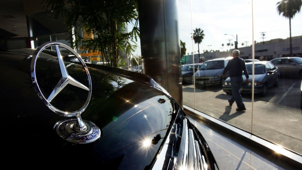 GLENDALE, CA - FEBRUARY 9: A pedestrian walks past a Mercedes-Benz dealership February 9, 2005 in Glendale, California. To pacify an animal rights group concerned about the thousands of cows that are slaughtered each year to make leather car seats and interiors, Mercedes-Benz has agreed to offer "leather-free" alternative versions of all its luxury cars. This comes after complaints from the German chapter of People for the Ethical Treatment of Animals which threatened protests. DaimlerChrysler plans to continue its leather versions on most of its Mercedes-Benz cars. (Photo by David McNew/Getty Images) Photographer: David McNew/Getty Images North America