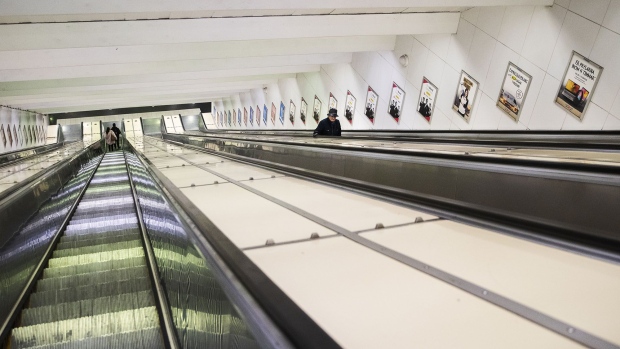 A deserted escalator at Ostermalmstorg subway station in Stockholm on March 17. Photographer: Nils Petter Nilsson/Getty Images