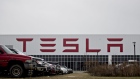 Vehicles sit parked outside the Tesla Inc. solar panel factory in Buffalo, New York, U.S., on Wednesday, Dec. 26, 2018. Employees at the factory this month kicked off a union-organizing campaign, a fresh challenge to the automaker that has so far successfully resisted similar efforts by the United Auto Workers at its sole car plant in Fremont, California. Photographer: Andrew Harrer/Bloomberg