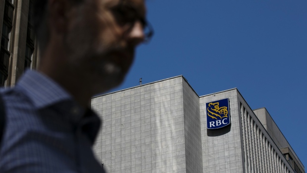 Royal Bank of Canada (RBC) signage is displayed on a building in the financial district of Toronto, Ontario, Canada, on Thursday, July 25, 2019. Canadian stocks fell as tech heavyweight Shopify Inc. weighed on the benchmark and investors continued to flee pot companies. Photographer: Brent Lewin/Bloomberg