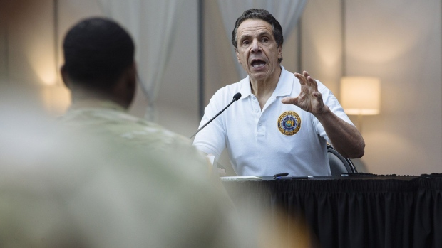 Andrew Cuomo, governor of New York, speaks during a news conference at the Jacob Javits Convention Center in New York, U.S., on Friday, March 27, 2020. Cuomo said he would seek federal assistance for four new emergency hospitals as the number of deaths statewide from the new coronavirus spiked 35% in a day to more than 500. Photographer: Bloomberg/Bloomberg