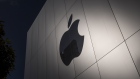 The Apple logo on a store in San Francisco. Photographer: David Paul Morris/Bloomberg