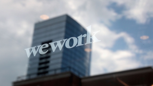 CHICAGO, ILLINOIS - AUGUST 14: A sign marks the location of a WeWork office facility on August 14, 2019 in Chicago, Illinois. WeWork, a real estate firm that leases shared office space, announced today that it had filed a financial prospectus with regulators to become a publicly traded company. (Photo by Scott Olson/Getty Images) Photographer: Scott Olson/Getty Images North America