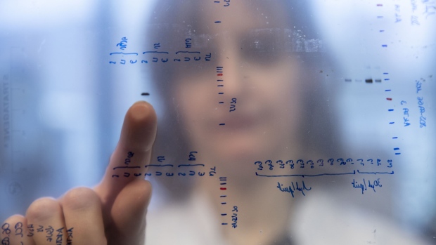 A French National Centre for Scientific Research (CNRS) researcher analyses Covid-19 protein information on a Western Blot sheet during coronavirus vaccine research work inside the Pasteur Institute laboratories in Lille, France, on Monday, March 9, 2020. The euro-area economy may be headed for its first recession in seven years as the coronavirus outbreak takes an increasing toll on businesses and consumer confidence. Photographer: Adrienne Surprenant/Bloomberg