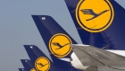 The Deutsche Lufthansa AG logo sits on tailfins of Boeing Co. 747 jets and Airbus A380 aircraft as they stand on the tarmac outside terminal A-plus at Frankfurt Airport, operated by Fraport AG, in Frankfurt. Photographer: Martin Leissl/Bloomberg