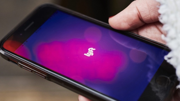 The Lyft Inc. application is displayed on an Apple Inc. iPhone in this arranged photograph taken in New York, New York, U.S., on Sunday, Feb. 24, 2019. Valued at $15.1 billion on the private markets in its last funding round, Lyft is aiming for an IPO valuation of $20 billion to $25 billion, a person familiar with the matter has said. Photographer: Gabby Jones/Bloomberg