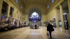 A passenger walks through a nearly empty Union Station during the evening commute in Toronto on March 25. Photographer: Cole Burston/Bloomberg