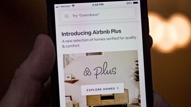The Airbnb Inc. application is displayed on an Apple Inc. iPhone in an arranged photograph taken in Arlington, Virginia, U.S., on Friday, March 8, 2019. Airbnb agreed to buy HotelTonight, its biggest acquisition yet, in a move to increase hotel listings on the site ahead of an eventual initial public offering for the home-sharing startup. Photographer: Andrew Harrer/Bloomberg