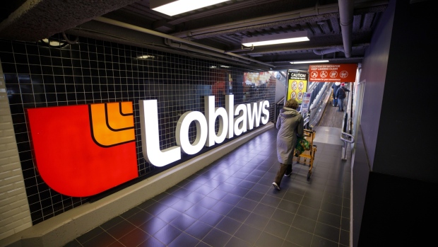 A shopper enters a Loblaw Cos. grocery store in Toronto. 