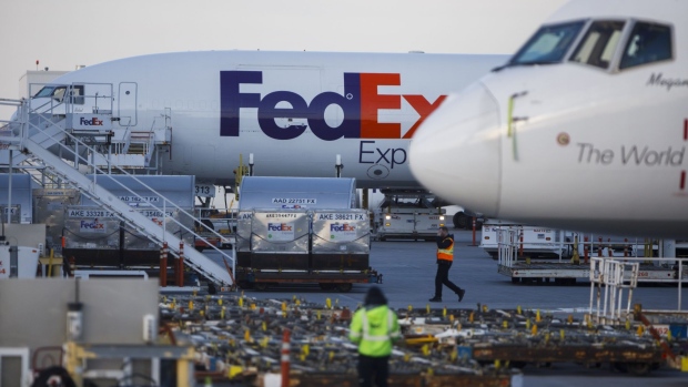 Cargo aircraft sit parked on the tarmac at a FedEx Corp. cargo facility at Toronto Pearson International Airport (YYZ) in Toronto, Ontario, Canada, on Wednesday, April 8, 2020. The airport is now averaging 200 flights per day, down from 1,200 before the Covid-19 pandemic, CTV News reported. Photographer: Cole Burston/Bloomberg