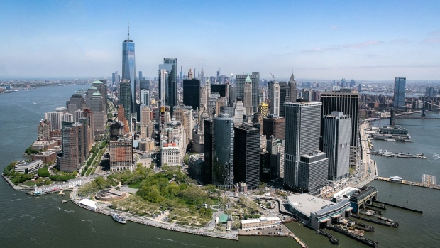 The lower Manhattan skyline is seen during a Blade Urban Air Mobility Inc. helicopter ride above the Financial District of New York, U.S., on Tuesday, May 7, 2019. Helicopters have been whisking the wealthy from Manhattan to New York's airports for decades. Now the ride with Blade costs as little as $195, and you can book it via a smartphone. Photographer: Jeenah Moon/Bloomberg