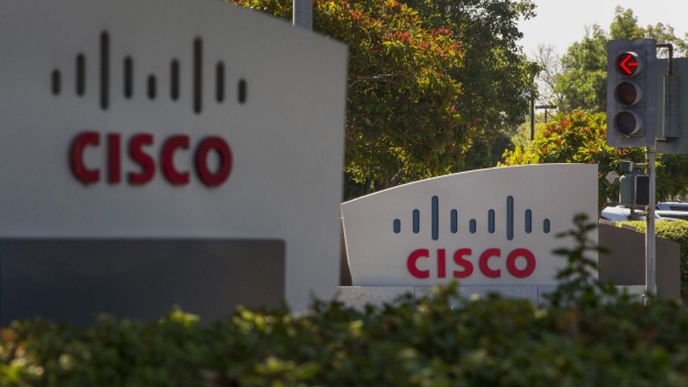 Cisco Systems Inc. signage stands at the company's headquarters in San Jose, California, U.S., on Friday, Aug. 15, 2014. Photographer: David Paul Morris